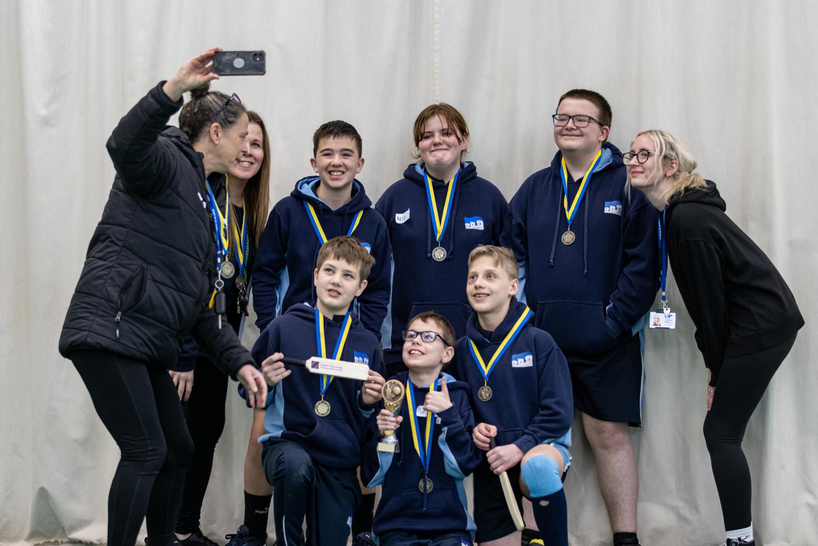 St James School celebrate being crowned County Table Cricket champions.