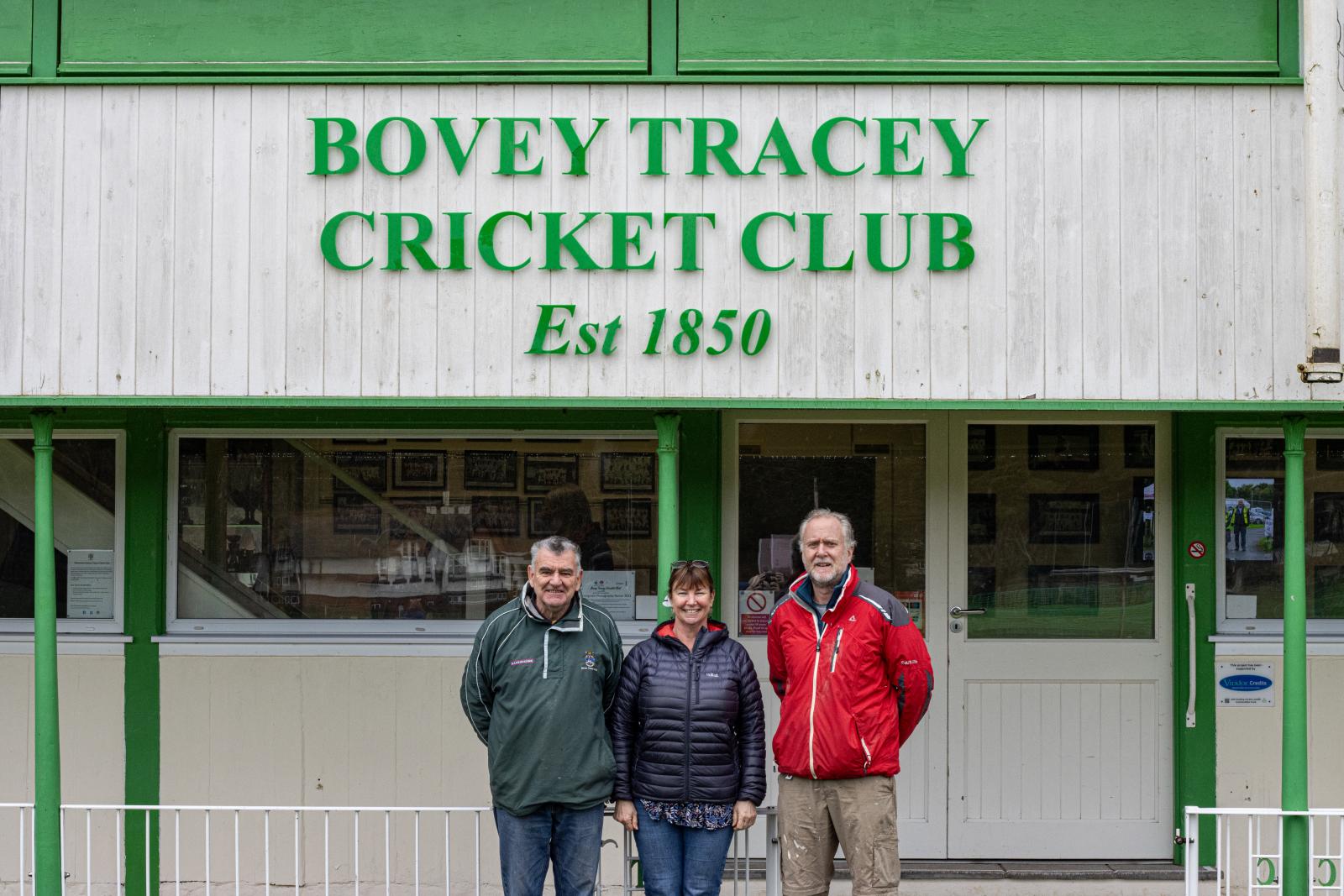 Tina England with previous Bovey Tracey CC Chairs, Nigel Mountford (left) and Andy Bishop.