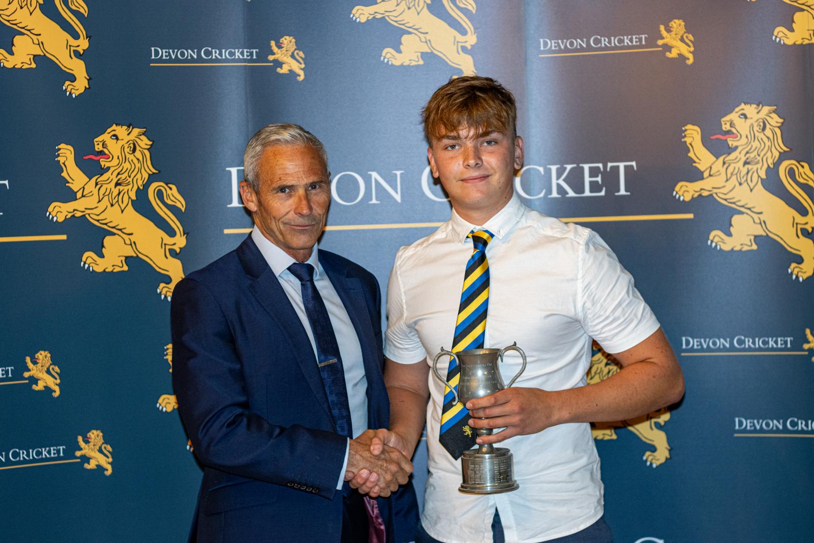 Charlie Gaywood is presented with the Under 16 Boys Player of the Year award by Andy Hurry.