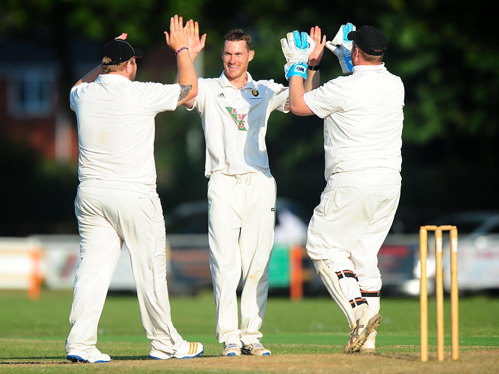 Celebration time for Alphington as a wicket falls to Matt Taylor (centre)<br>credit: www.ppauk.com