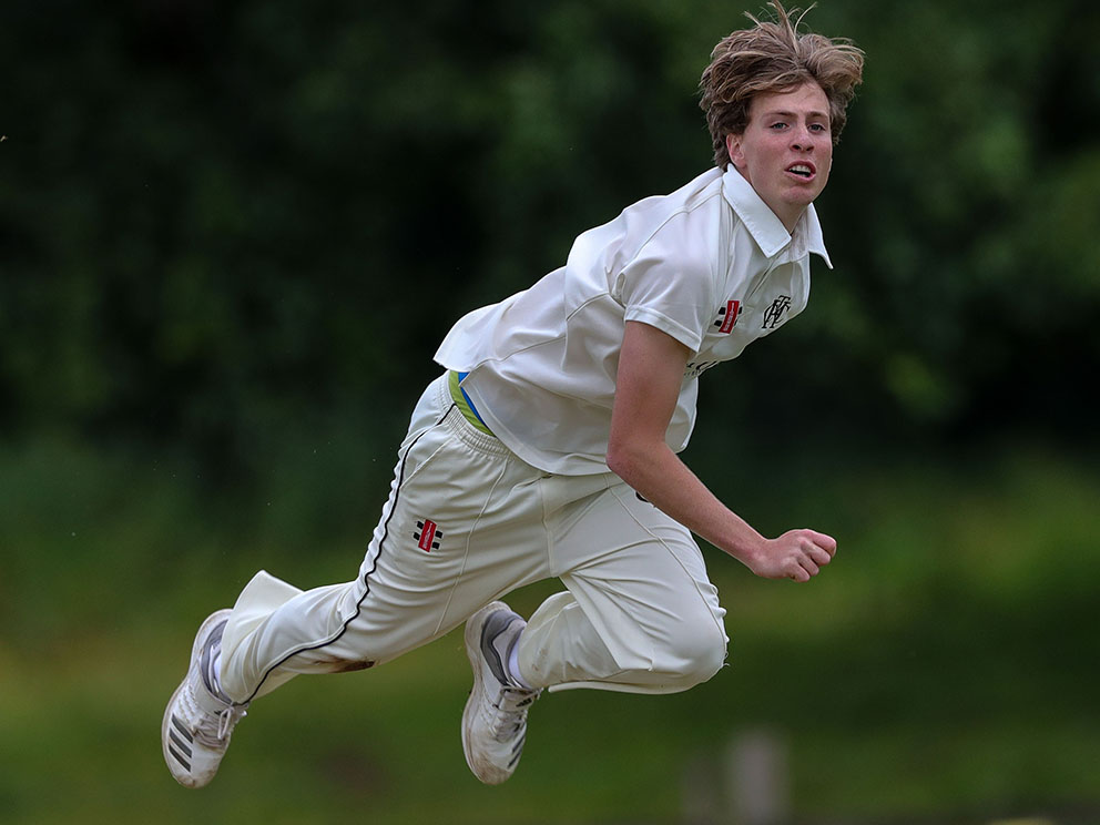 Christian Cabburn bowling flat out for Heathcoat against Sandford<br>credit: https://www.ppauk.com/photo/2129967/