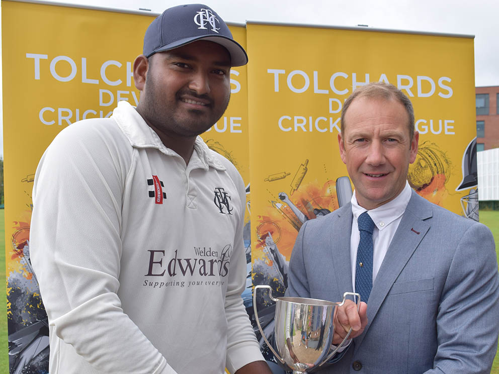 Heathcoat's double-winning captain Jackson Thompson, pictured here receiving the TDCL Premier Division trophy from James Hunt from sponsors Tolchards Drinks, who features on the front of the 2020 Devon Cricket Yearbook<br>credit: Conrad Sutcliffe