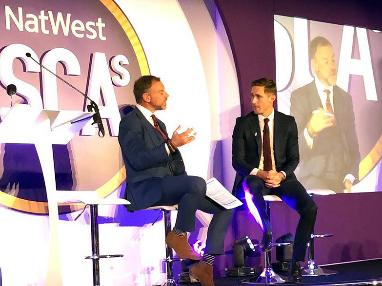 Charlie Dagnall (left) chatting to England World Cup winner Chris Woakes at the OSCAs lunch
