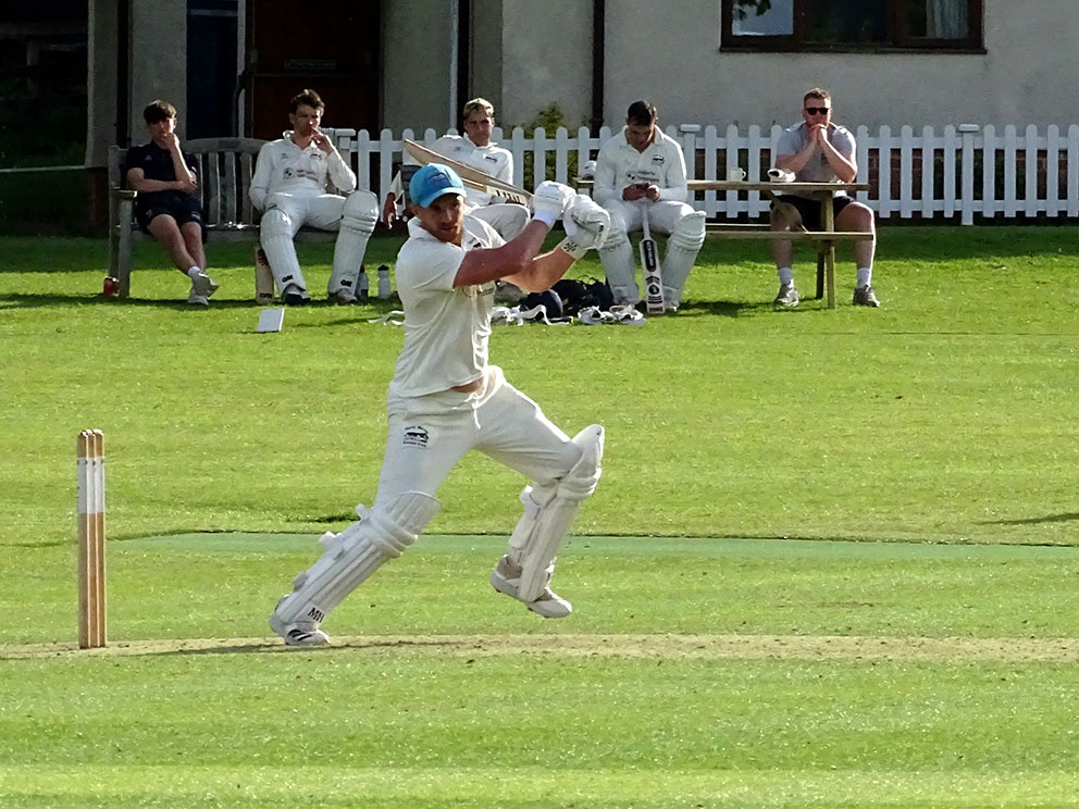 Tom Popham smashes the ball down the hill at Sandford<br>credit: Fiona Tyson