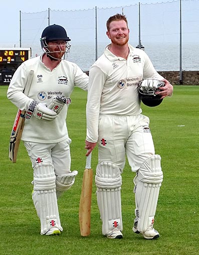 Dan Bowser (left) and Josh Atkinson on the way off after sealing victory over Sidmouth