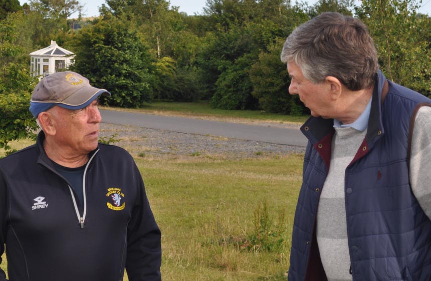 Brixham coach George Breyley (left) chatting to Ed Leverton from the Tolchards Devon Cricket League