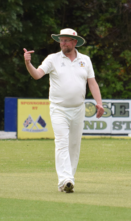 Exeter's acting captain Mark Gribble adjusts the field