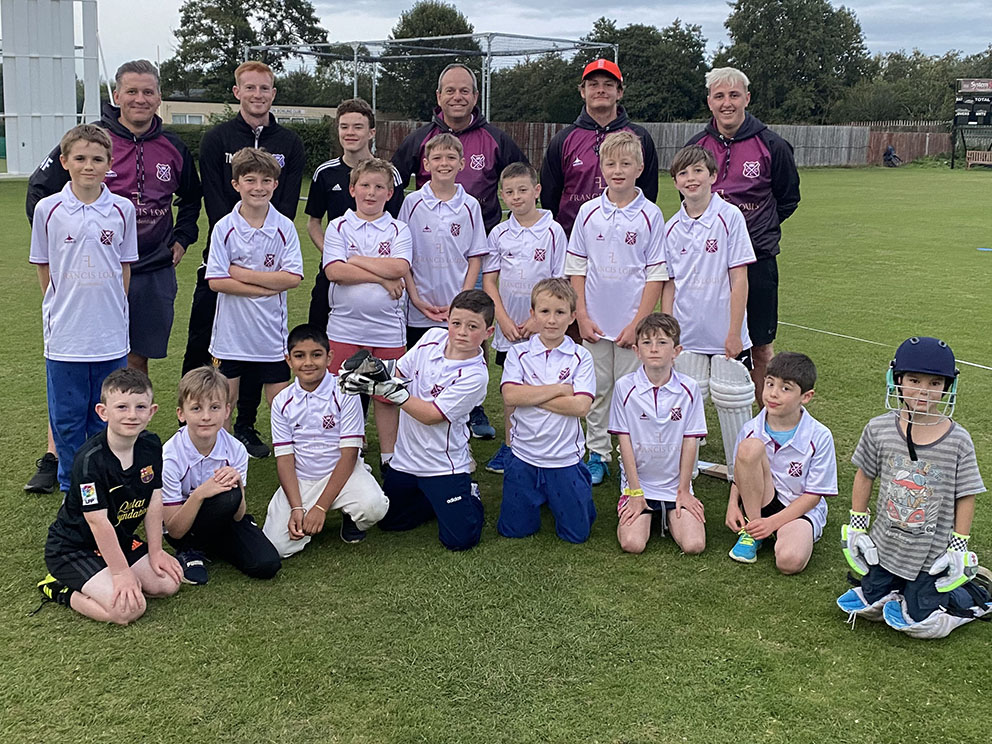 Cullomptons young cricketers â€“ and coaches â€“ take a break on a training night<br>credit: Adam Friend