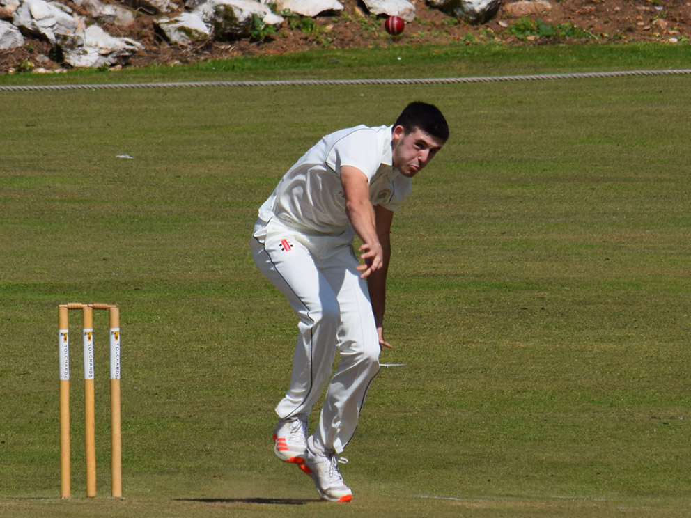 Ivybridge seamer James Grigg steaming in down the hill at Ipplepen<br>credit: Conrad Sutcliffe - no re-use without copyright owner's consent