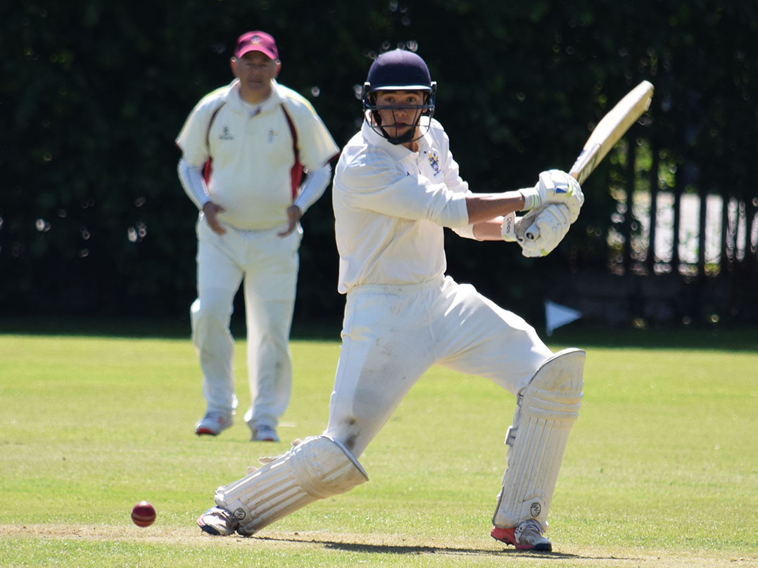 SQUARE ENOUGH: Bovey Tracey opener Sam Taylor drives square of the wicket on his way to 36 against Ipplepen in Sunday’s Aaron Printers Cup semi-final win over Ipplepen <br>credit: Conrad Sutcliffe - no re-use without copyright owner's consent