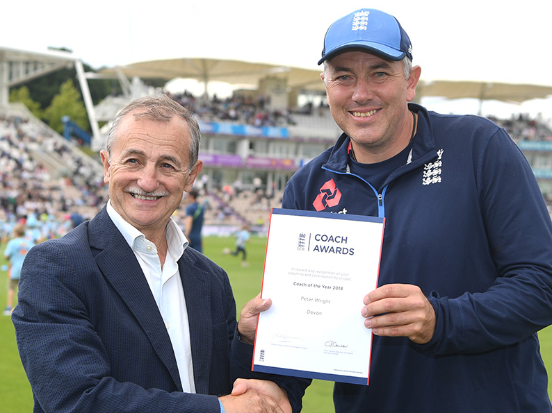 Peter Wright (left) receiving his ECB coaching award from Chris Silverwood