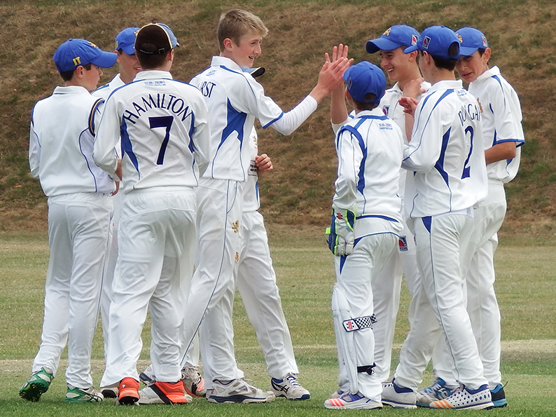 Celebration time for Devon U14s as a wicket falls against Gloucestershire