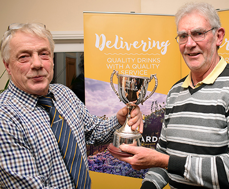 Flashback! Devon League chairman Nick Rogers (left) presenting the services to the league cup to David Gambie as last year