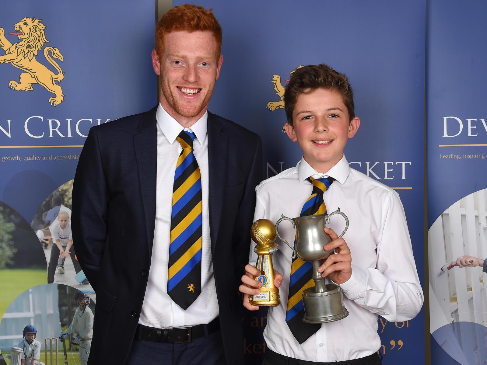 Max Hancock (right) at the Devon Cricket Awards collecting a trophy from 