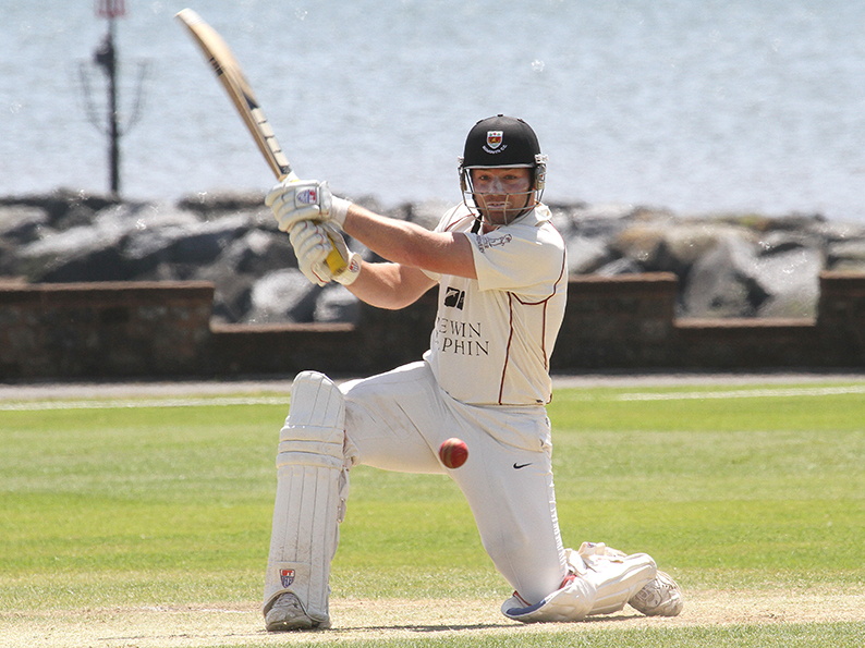Matt Cooke hitting out for Sidmouth on a sunny day at the Fortified