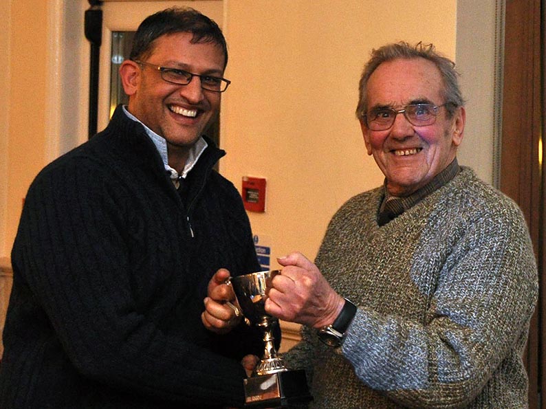 Sidmouth's Saj Patidar receiving one of the club's many awards at the DCL presentation night