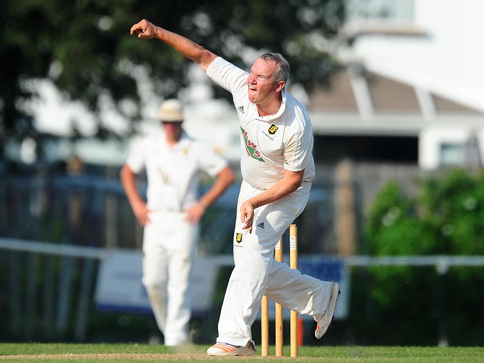 Stuart Shaw on his way to one of the 200-plus wickets he took for Alphington