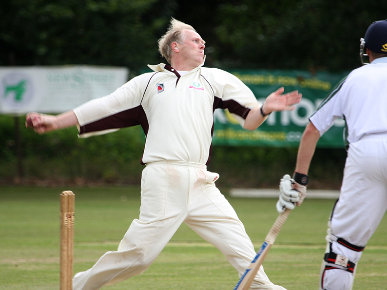 Mark Woodman bowling for Ottery in 2011