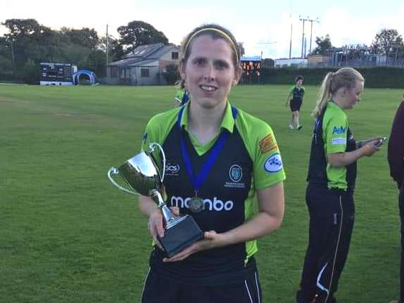 Laura Currie of Taunton Deane with the Super Eights Trophy after her side won it at Hatherleigh last weekend