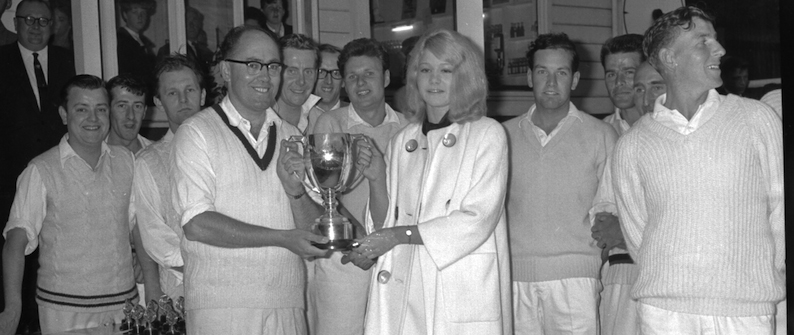 Skipper Vic Stoneman collecting the Narracott Cup from Roxanne Narracott after Babbacombeâ€™s win in the 1963 final