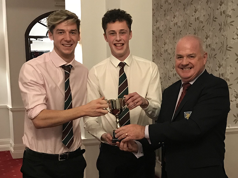 Bryon Knowles and Daley Holmes, who shared Sidmouth 2nd XI's bowling award. The presentor is Richard Brice of Devon County Sports