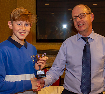 Harry Pitman receives his 4th XI player of the year award from proud dad Mark