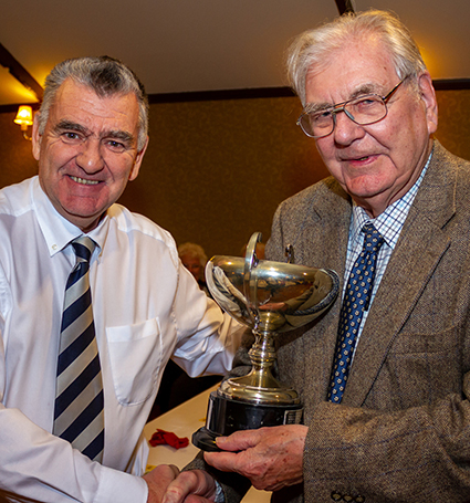 Nigel Mountford (left) hands over the BTCC clubman of the year trophy to Pat Colling