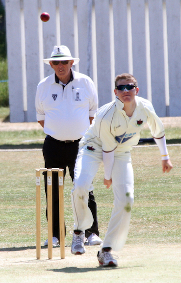 Chris Shelton umpiring Exmouth versus Plymouth in 2013. Standing at the other end was Pete Bamber