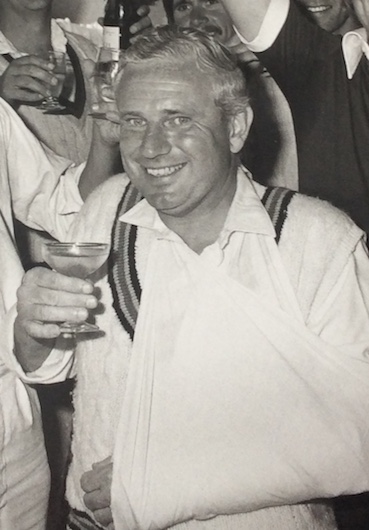 Geoff Evans toasting Devon's 1978 Minor Counties triumph despite suffering a broken arm when he batted in the first innings