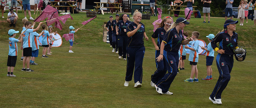 A guard of honour for Devon as they run out against Somerset at Wombat CC