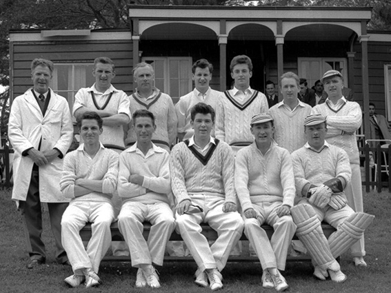 Cockington in 1963 in front of their old pavilion. Skipper Mike Janes is in the middle of the front row