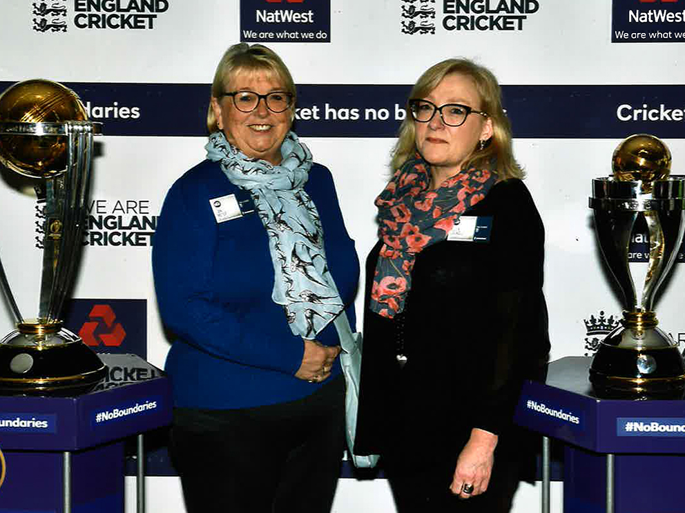 Barton's Jan Meyer (left) and guest Ellen Grindley pose with the Cricket World Cup won by England in the summer 