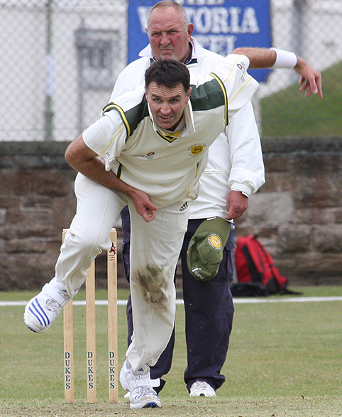 Joel Murphy bowling for Budleigh on a previous visit to Sidmouth