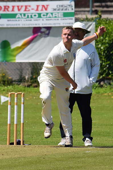 James Allen on the way to a five-wicket haul against Paignton 2nd XI