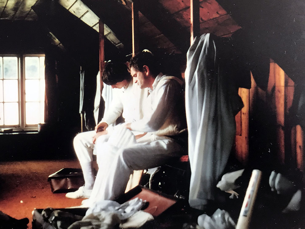 Alan Wardrop (right) padding up in the Sidmouth dressing room with a youthful Graham Bess