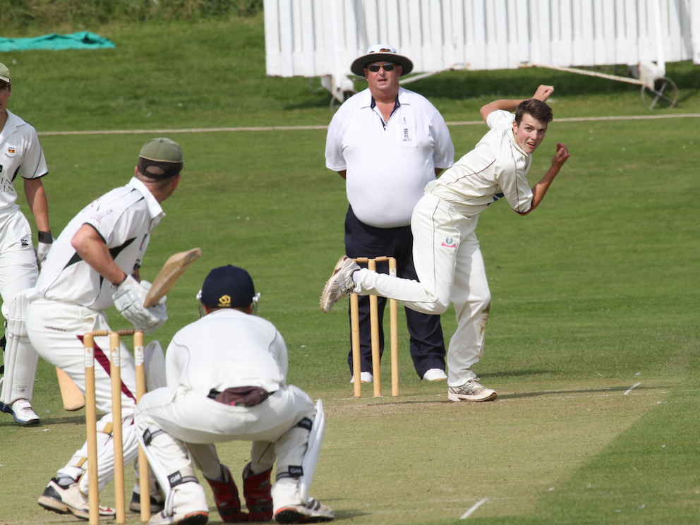 Pete Bamber standing in the game between Exmouth and Sidmouth during the 2012 Premier Division season. The bowler is Exmouth’s Max Curtis