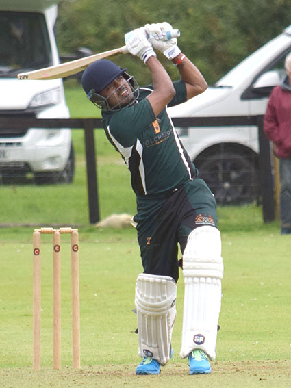Aditya Sanapala hits out on the way to Plymouth's top score of 57