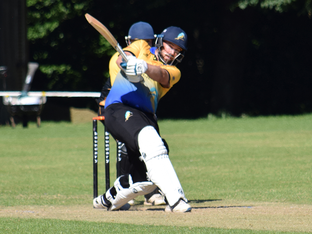 Sandford's Richard Foan tucks into the Bradninch bowling on his way to a quickfire 66