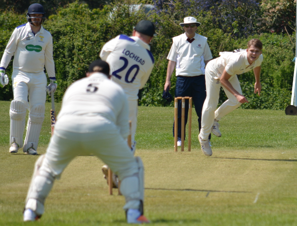 A&CW's Luan Liebenberg hurls down a delivery to Braunton's Toby Lochead