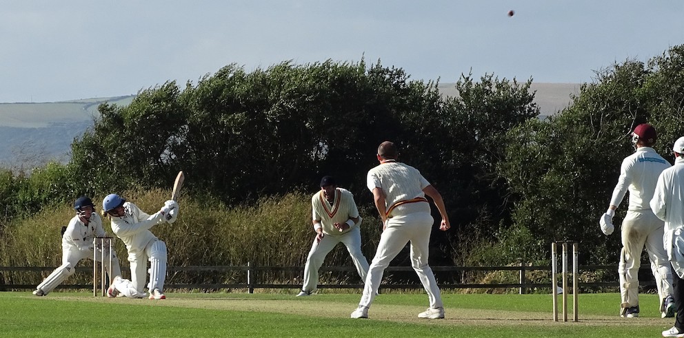 North Devon's Jay Rothery batters the MCC bowling to the boundary