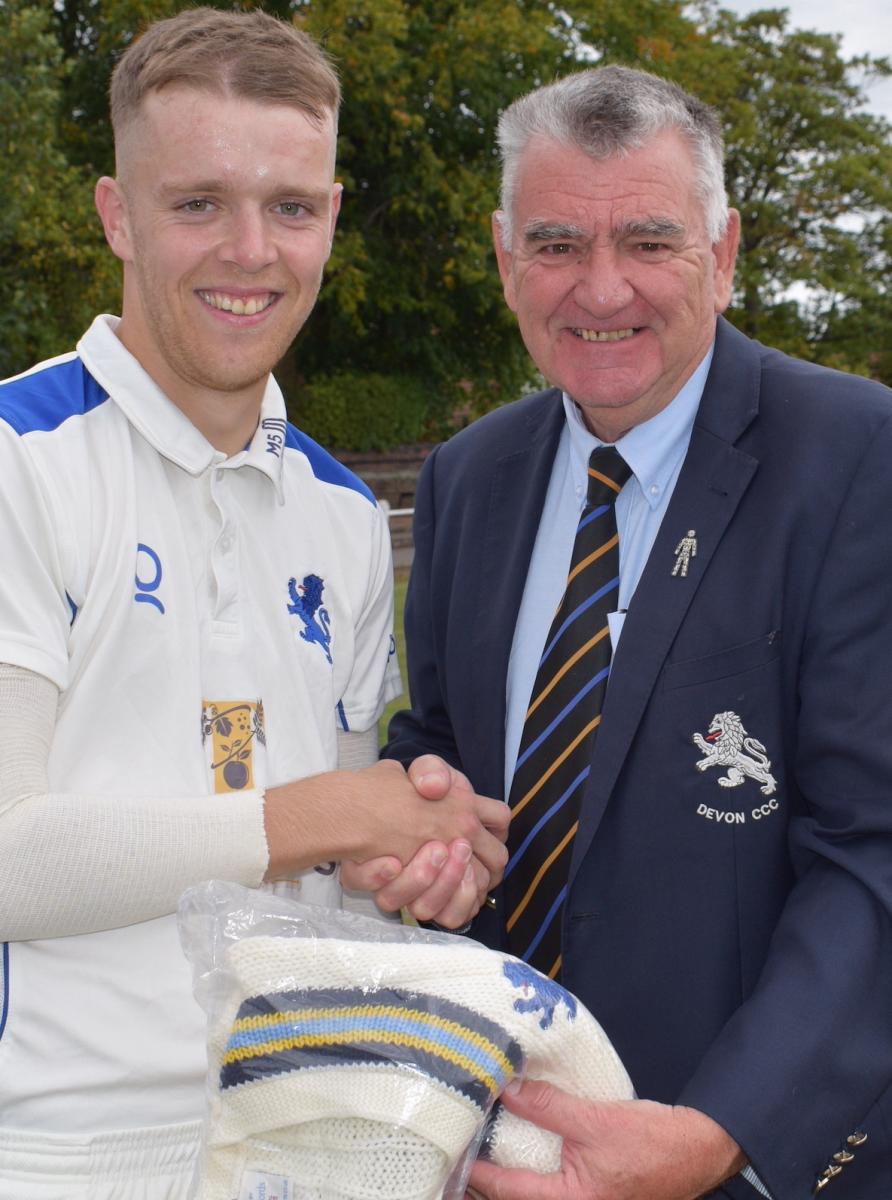 Craig Penberthy collects his county sweater from Devon CCC chief executive Nigel Mountford, Sweaters are awarded to players when they reach five Championship appearances