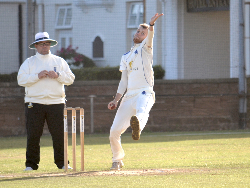 Craig Penberthy operating from the Belmont Hotel End under the keen eye of umpire Dean Daniels