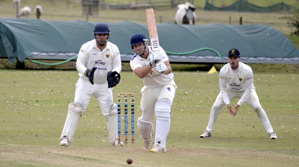 Devon's Matt Skeemer driving off the front foot against Cornwall