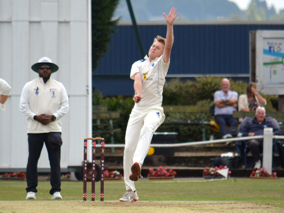 Matt Jeacock jumps into his delivery stride during his spell against Bucks