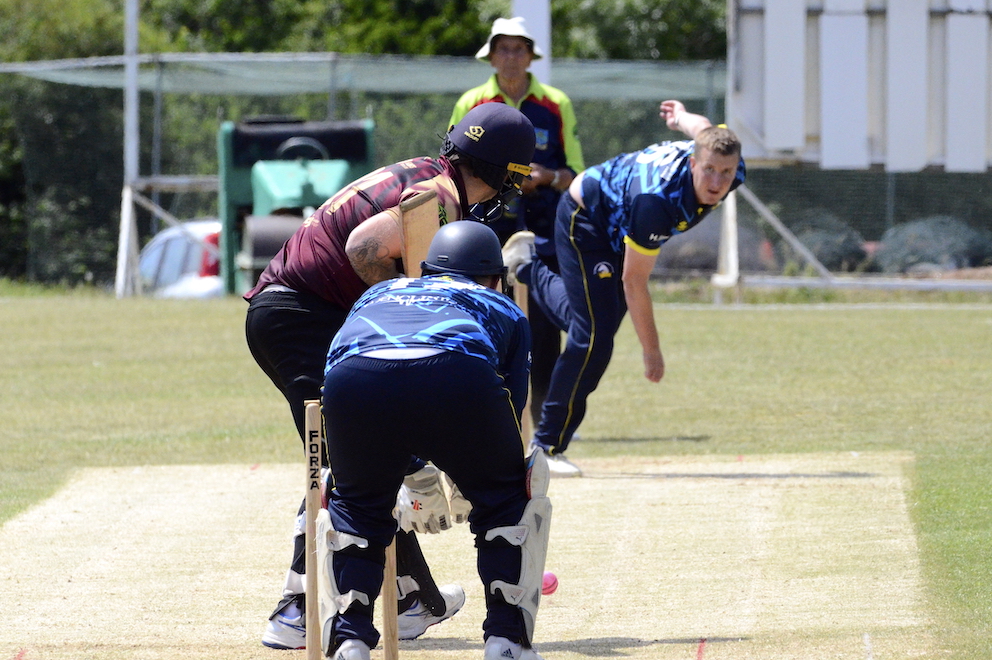 Plymstock's Rob Cunningham bowling against Stoke Gabriel<br>credit: Conrad Sutcliffe - no re-use without copyright owner's consent