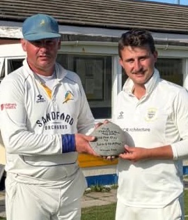 John James (left) hands the James-Ford Trophy to Jack Ford