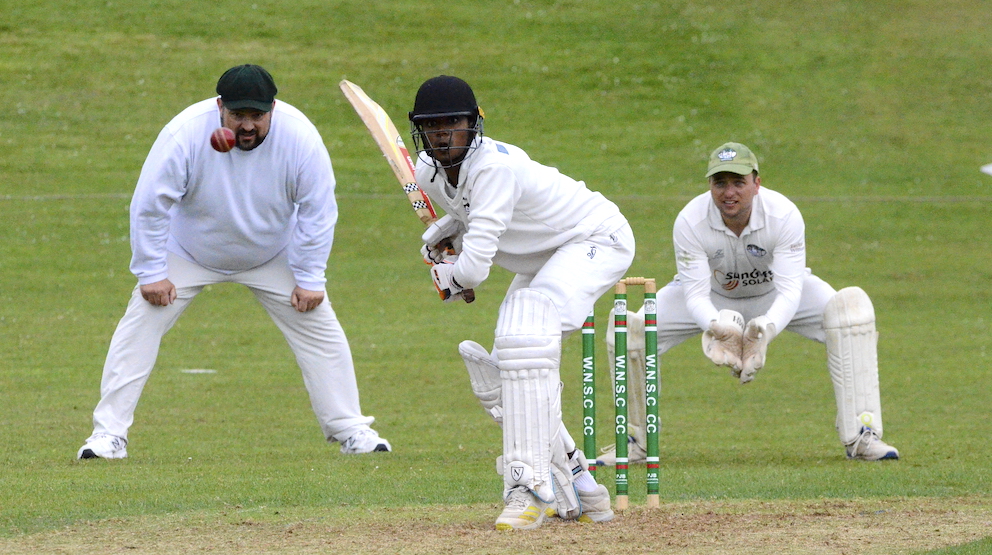 North Devon's Navindu Vanderbona takes on the Woodbury & Newton St Cyres bowling<br>credit: Conrad Sutcliffe - no re-use without copyright owner's consent