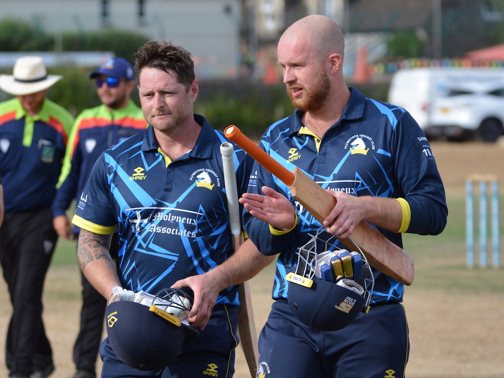 Chris Davies (left) and Josh Sumner (right) walk off after steering Plymstock to a 10-wicket win over Chagford in the Corinthian Cup final