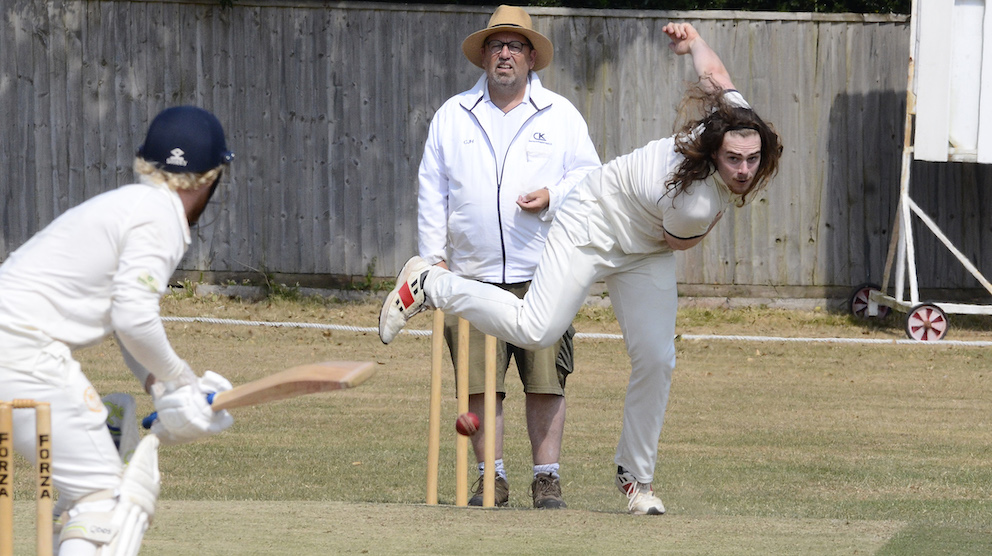 Lewdown's six-wicket seamer Wilf Mallinson bowling to Stoke Gabriel's Dan Bullock<br>credit: Conrad Sutcliffe - no re-use without copyright owner's consent