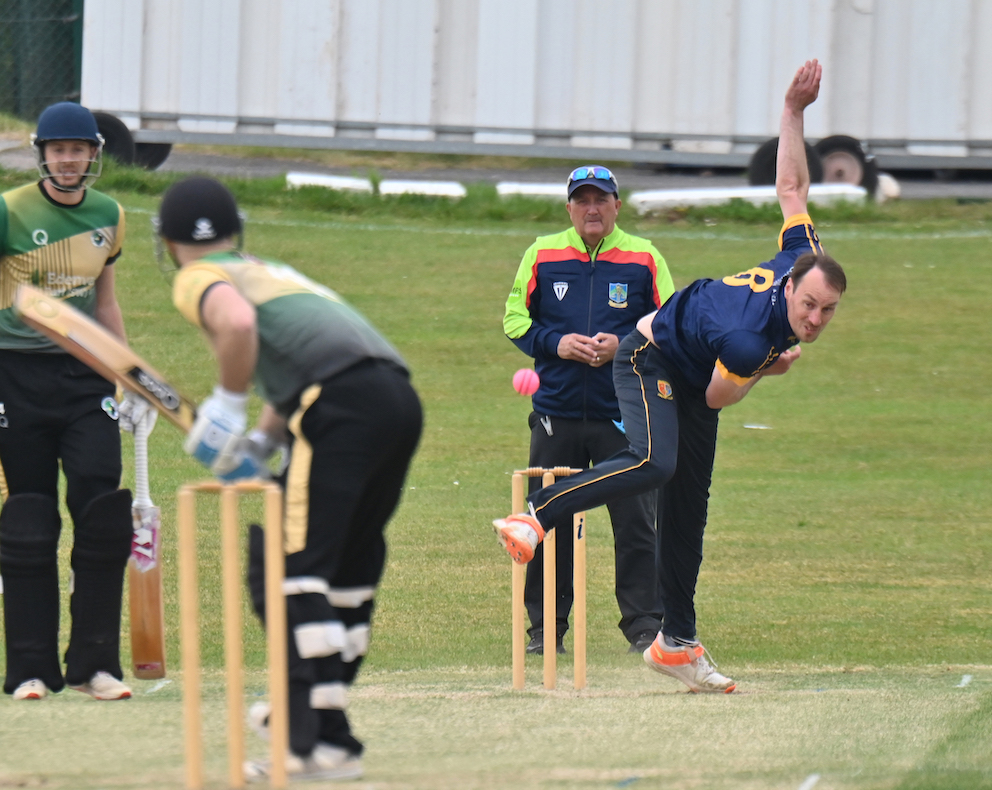 Tavistock's James McGahey flings down a delivery to Bradninch & Kentisbeare opener Gary Chappell